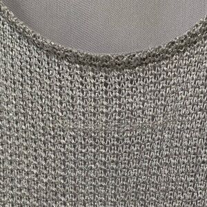 Sleeveless dress, silver knit, with light gray lining. Size 6-8 made by Promod